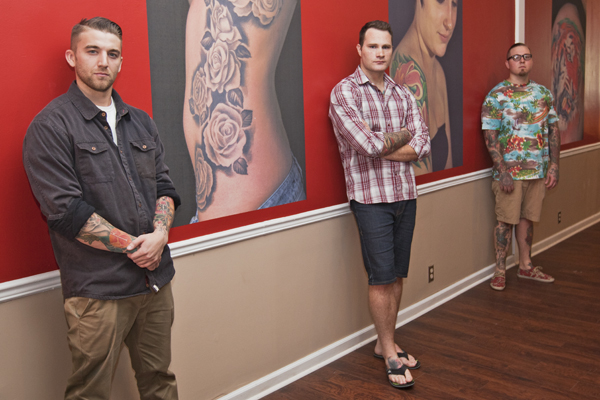 The artists of Sacred Tattoo